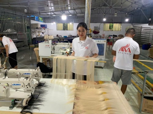 AVA HAIR MANUFACTURES STANDARD TAPE-IN HAIR EXTENSIONS AT OUR FACTORY